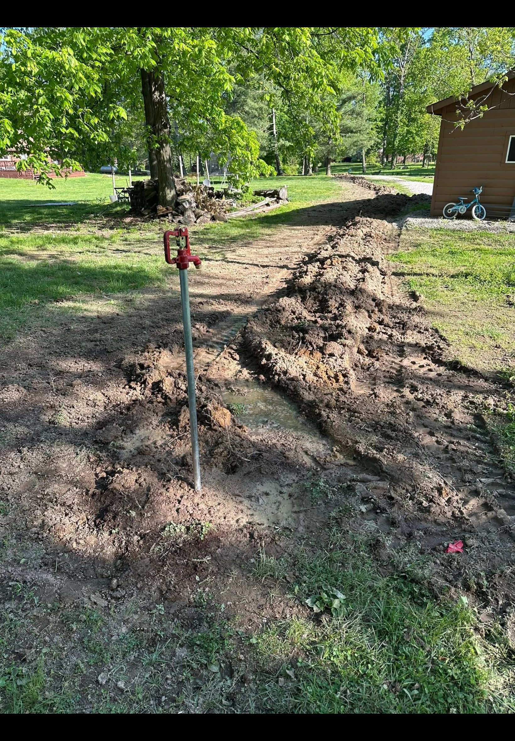 Yard hydrant installed at residential property